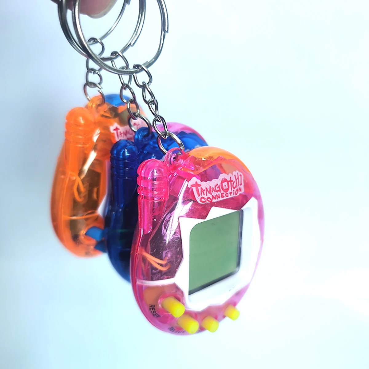 Nostalgic Virtual Digital Electronic Growing Pet Machine Cyber Handheld Keychain Game Machine Pet Interactive Growing Toy forKid